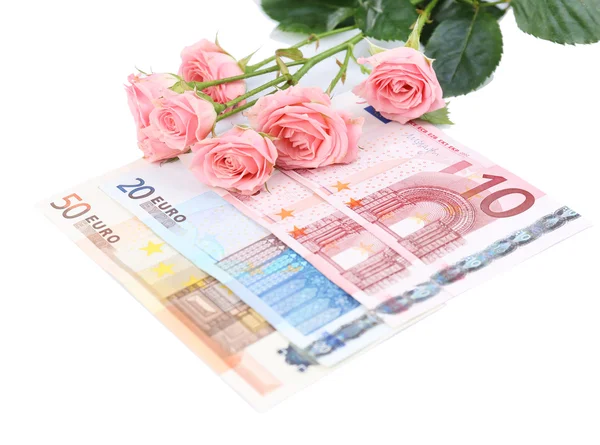 Hermosas rosas y dinero, aislado en blanco —  Fotos de Stock