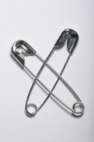 Safety pins isolated on white — Stock Photo, Image