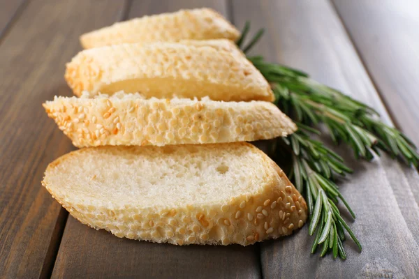 Fresh bread and rosemary — Stock Photo, Image