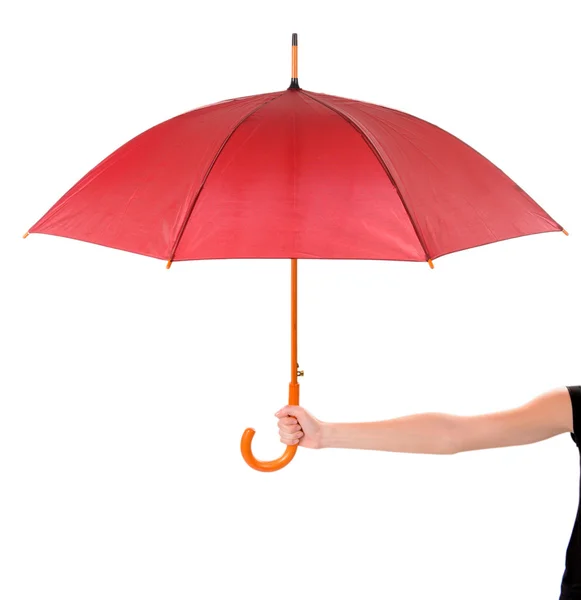 Červený deštník v ruce izolovaných na bílém — Stock fotografie