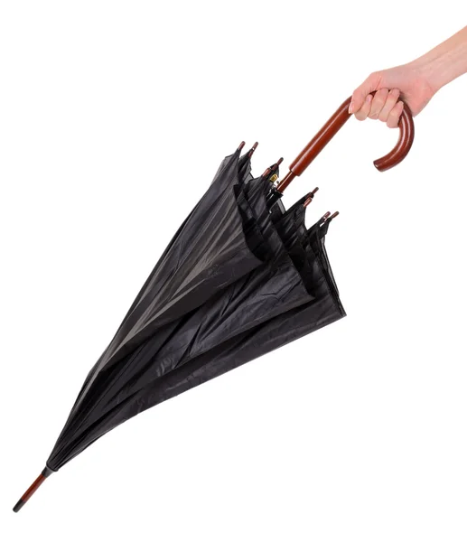 Black Umbrella in hand isolated on white — Stock Photo, Image