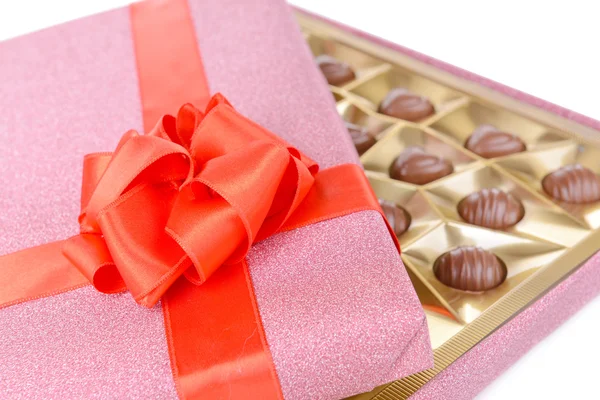 Delicious chocolates in box close-up — Stock Photo, Image