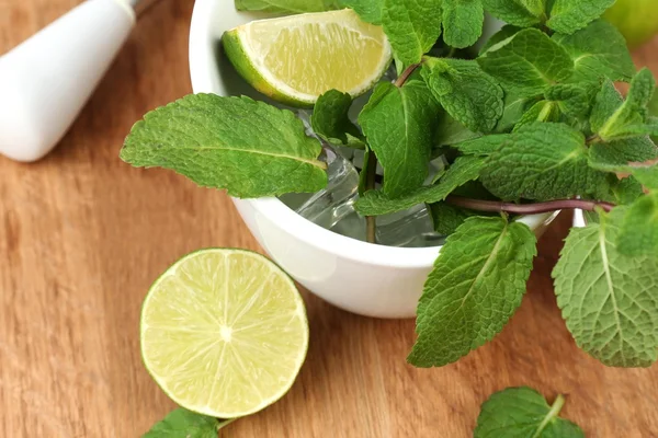 Ingredients for lemonade on wooden table — Stock Photo, Image