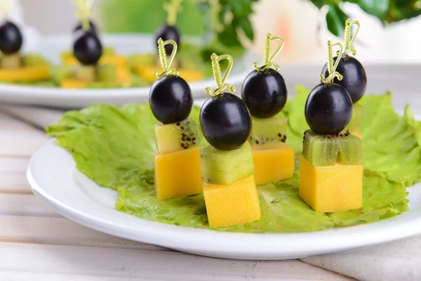 Delicious canapes on table close-up — Stock Photo, Image
