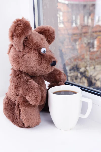 Toy-bear looking out window close-up — Stock Photo, Image