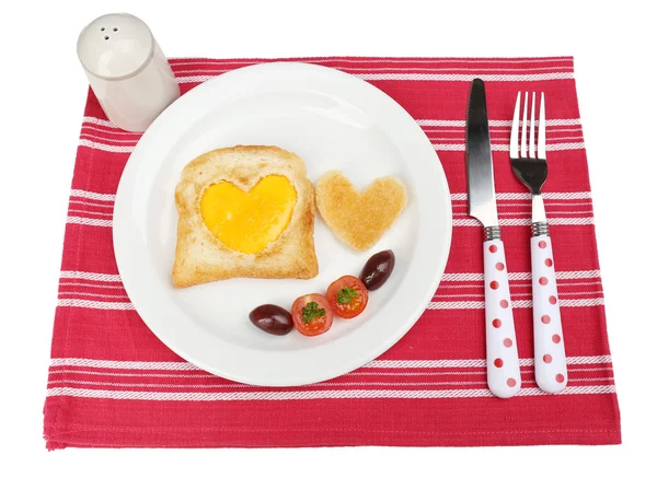 Scrambled eggs with bread on plate, on color napkin — Stock Photo, Image