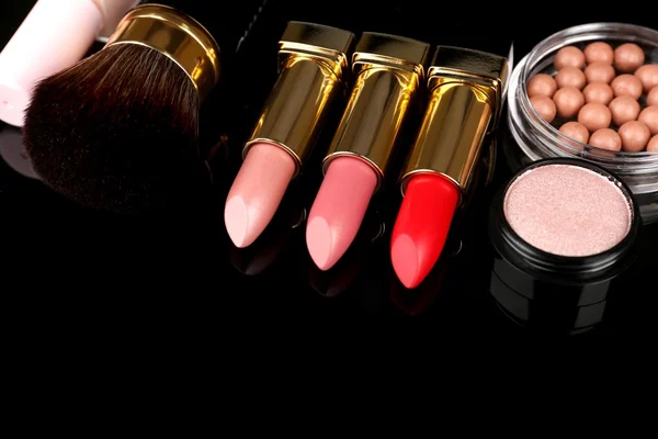 Professional make-up tools on black background — Stock Photo, Image