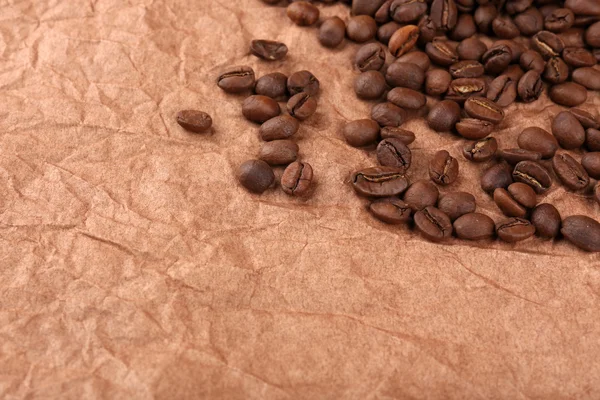 Café en grains sur table close-up — Photo