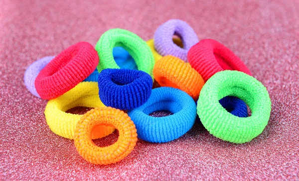 Colorful scrunchies on pink background — Stock Photo, Image