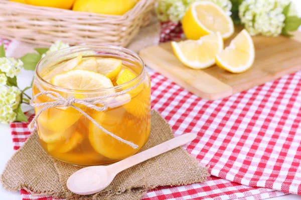 Tasty lemon jam on table close-up — Stock Photo, Image