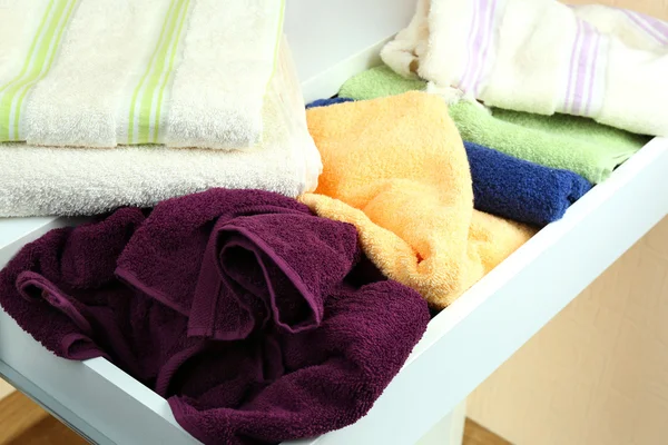 Towels in open drawer — Stock Photo, Image