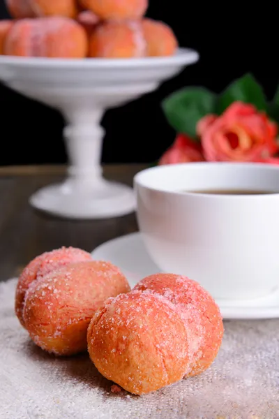 Delicious cookies peaches on table on black background — Stock Photo, Image