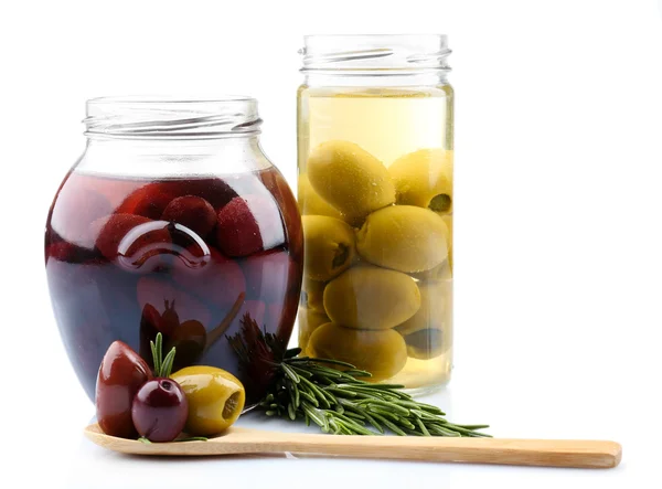 Tasty olives in glass jars, isolated on white — Stock Photo, Image