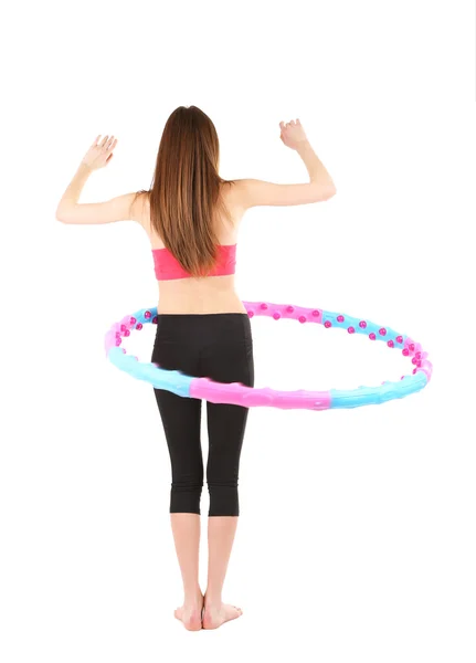 Frau macht Übungen mit Hula-Hoop-Reifen isoliert auf weiß — Stockfoto