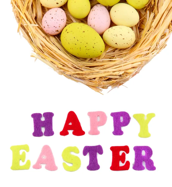 Easter eggs in nest and Happy Easter sign, isolated on white — Stock Photo, Image