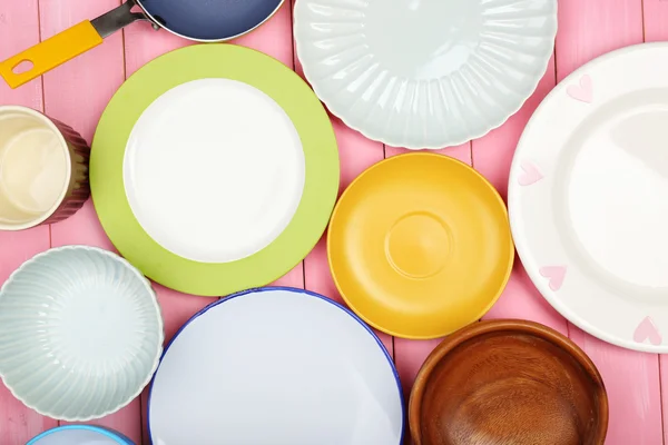 Different tableware on wooden background — Stock Photo, Image