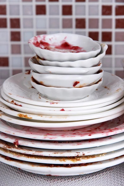 Dirty dishes on bright background — Stock Photo, Image