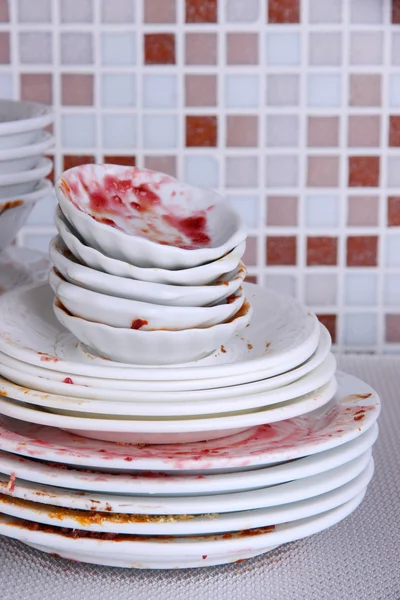 Dirty dishes on bright background — Stock Photo, Image