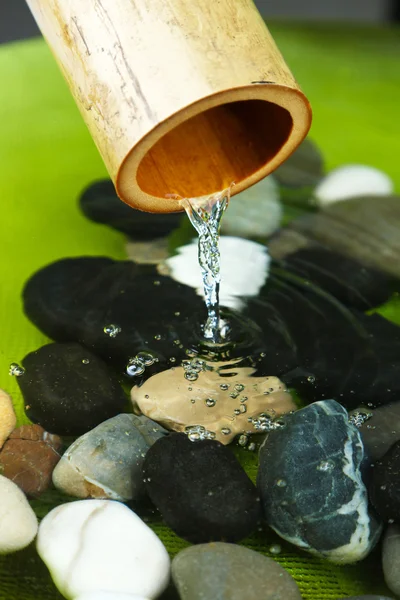 Spa still life with bamboo fountain and stones, close up — Stock Photo, Image