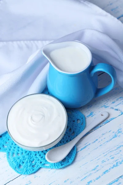 Dairy products on wooden table background — Stock Photo, Image