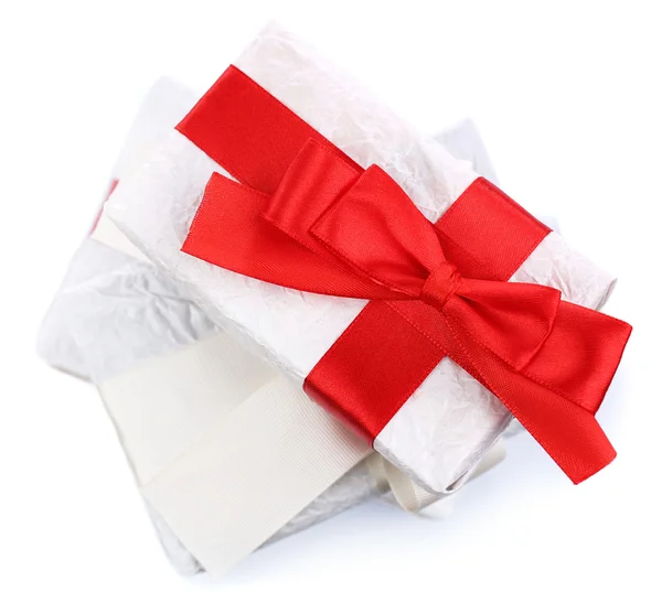 Beautiful gifts with ribbons, isolated on white — Stock Photo, Image