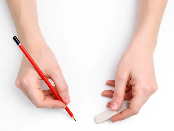 Human hands with pencil and erase rubber, isolated on white — Stock Photo, Image