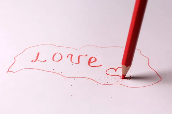 Cuvânt Dragoste și creion pe hârtie, închide — Fotografie, imagine de stoc
