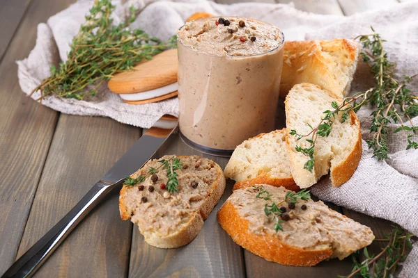 Fresh pate with bread on wooden table — Stock Photo, Image