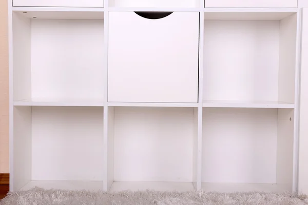 Empty white shelves close up — Stock Photo, Image