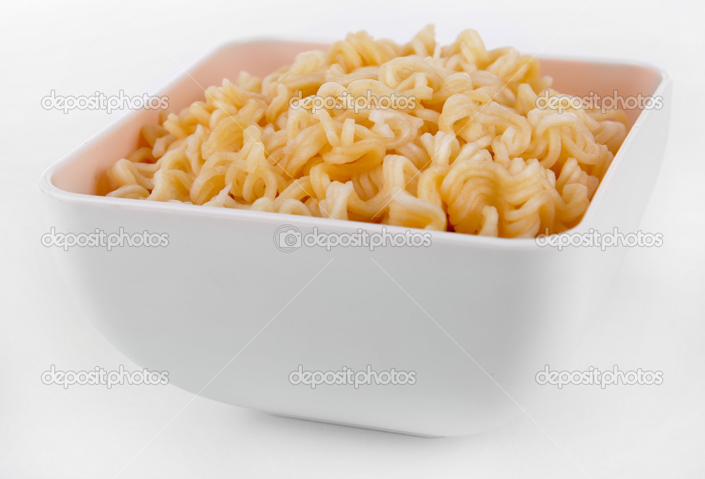 Tasty instant noodles in bowl isolated on white