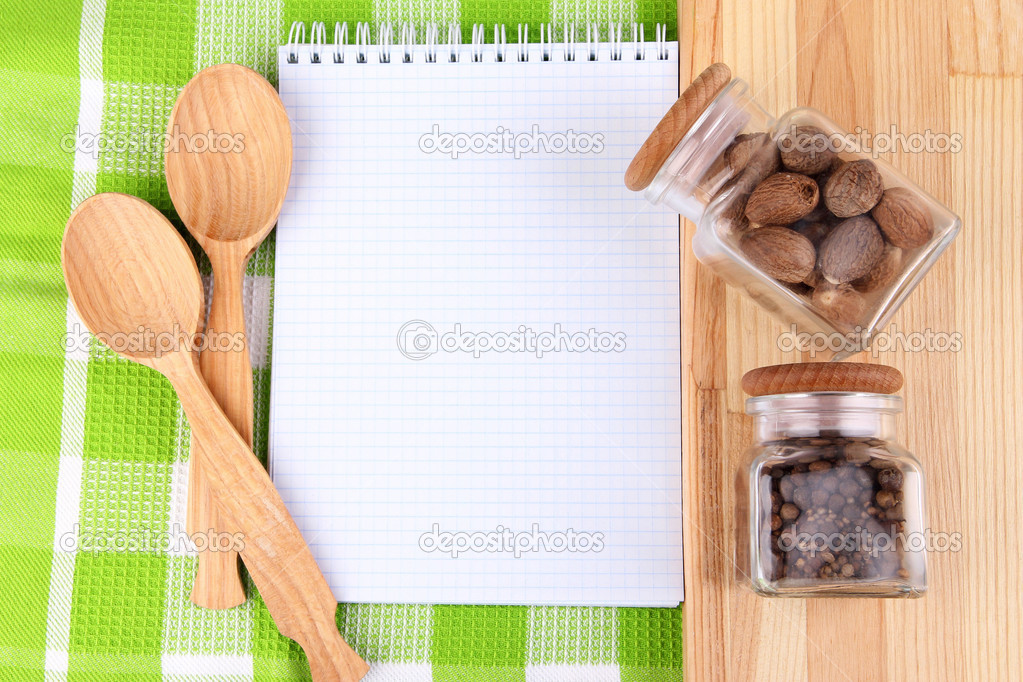 Blank recipe book on bright background Stock Photo by ©belchonock 43870477