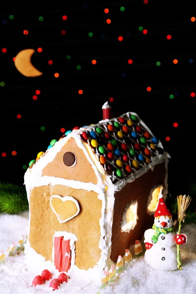Gingerbread house on dark background — Stock Photo, Image