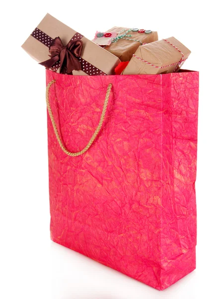 Presents in paper bag isolated on white — Stock Photo, Image