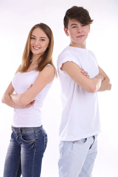 Twee mooie jonge mensen geïsoleerd op wit — Stockfoto