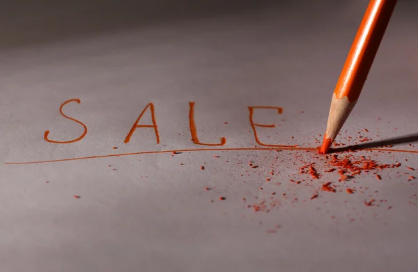 Word Sale and breaking pencil on paper, close up — Stock Photo, Image