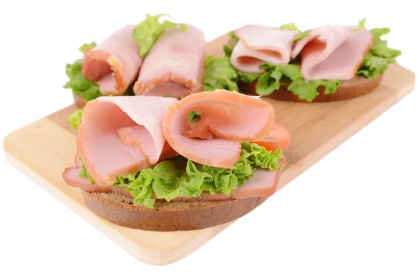 Sanduíches deliciosos com alface e presunto isolados em branco — Fotografia de Stock