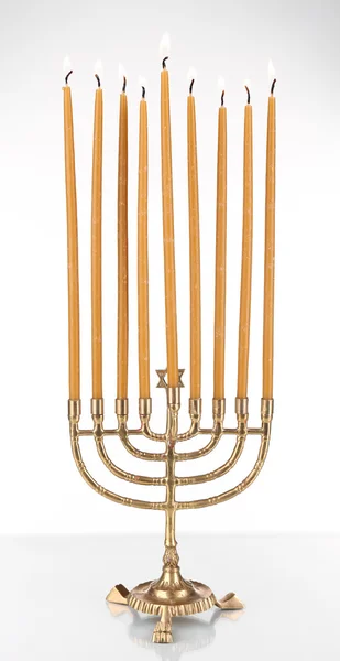 Hanukkah menorah with candles isolated on white — Stock Photo, Image