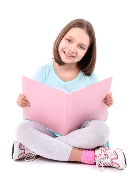 Schönes kleines Mädchen mit Buch, isoliert auf weiß — Stockfoto