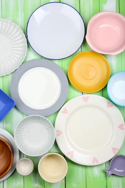 Different tableware on wooden background — Stock Photo, Image