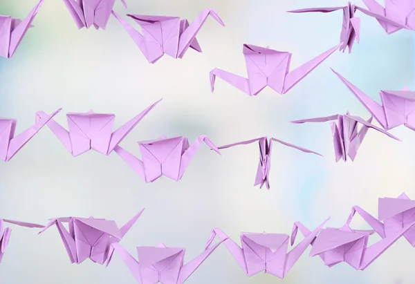 Grúas de origami sobre fondo claro —  Fotos de Stock