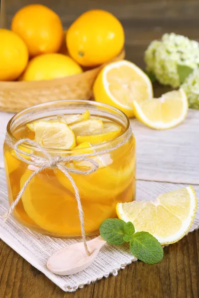 Tasty lemon jam on table close-up — Stock Photo, Image