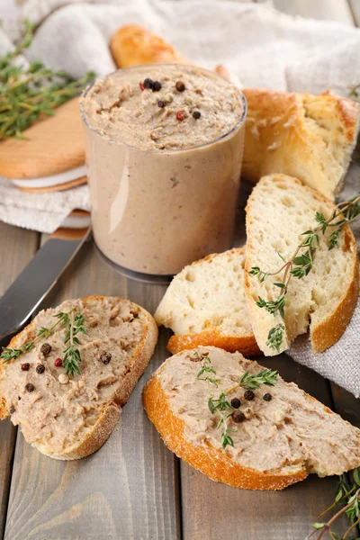 Fresh pate with bread on wooden table — Stock Photo, Image