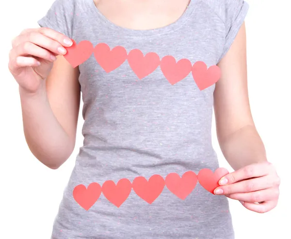 Manos sosteniendo corazones de papel aislados en blanco — Foto de Stock