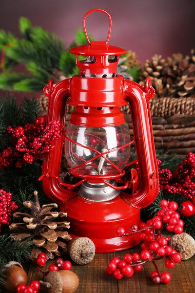 Red kerosene lamp on dark color background