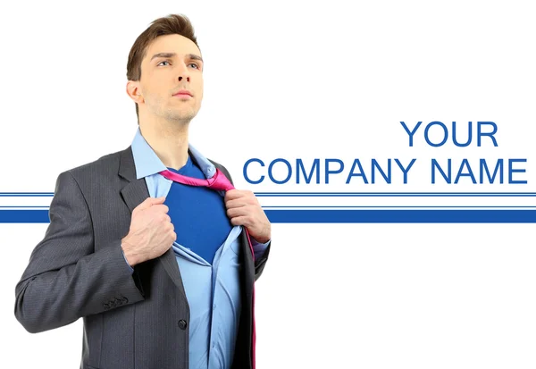 Young business man tearing apart his shirt revealing  superhero suit, isolated on white — Stock Photo, Image