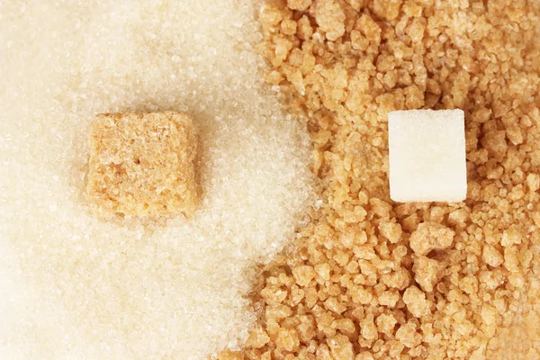 Beyaz şeker ve kahverengi şeker yakın çekim paterni — Stok fotoğraf