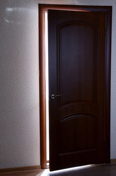 Open door with bright light outside — Stock Photo, Image