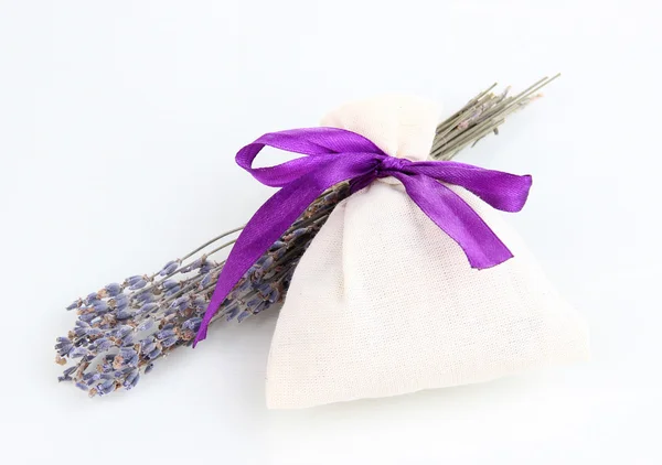 Textile sachet pouch with dried lavender flowers isolated on white — Stock Photo, Image