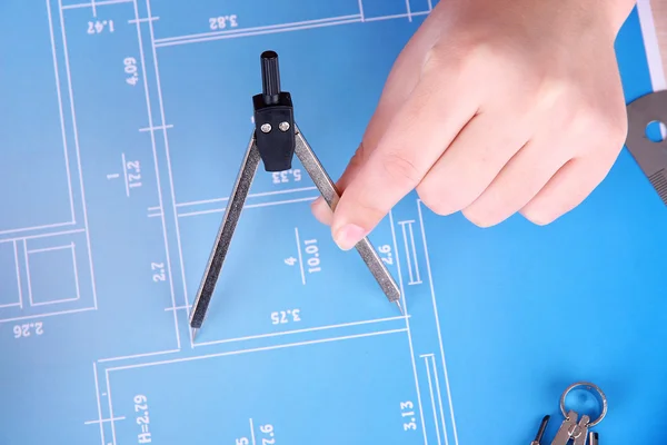 Architectural project with female hands, close up — Stock Photo, Image