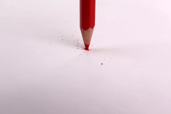 Breaking pencil on paper, close up — Stock Photo, Image